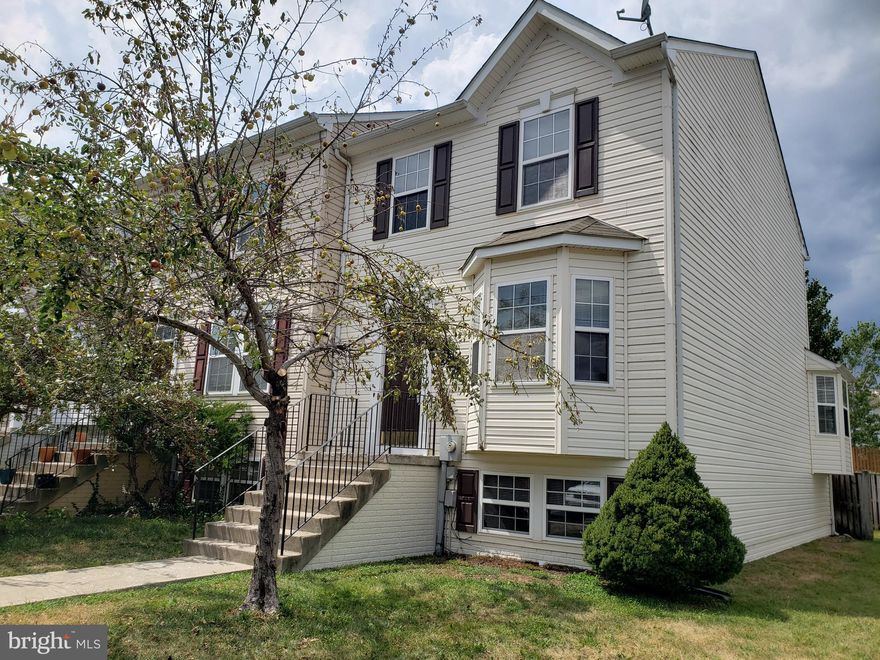 END UNIT with Fenced Back Yard.  New Carpet.  Fresh Paint inside & out.  New Kitchen Floor.  New Washer & Dryer on the way.  Basement with Full Rough In and more room to finish your way.