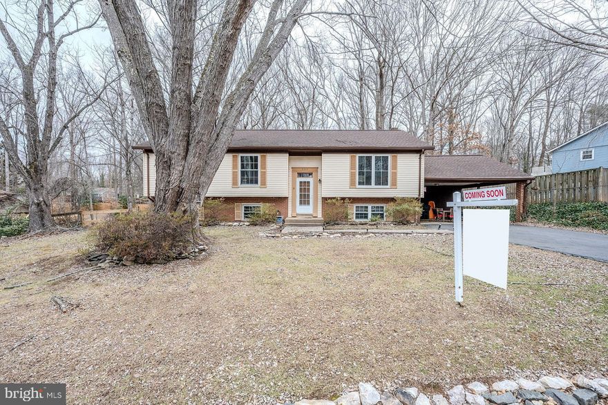 Charming Oak Ridge Estates Home – No HOA, ½ Acre Lot, Investment Potential! Looking for a home with great potential? This split-level gem in Oak Ridge Estates is perfect for those ready to add their personal touch and build sweat equity! Nestled on a tranquil private treed lot in a desirable neighborhood off Prince William Parkway, this property offers ½ acre of land, mature trees, and no HOA! While this home is being sold As-Is, the major systems have been updated for peace of mind: ✔ Roof (2017) ✔ Water Heater (2014) ✔ Windows (2006) ✔ Refrigerator & Stove (2019) ✔ HVAC (2012) ****** Featuring 3 bedrooms, 3 full baths, and room to add 1-2 additional bedrooms in the lower level, this home is both spacious and flexible. The lower level walkout includes a bathroom, custom bar, and multiple family rooms, one with a cozy wood-burning stove. ****** Outdoor enthusiasts will love the private fenced backyard with a tiered deck, a storage shed, and custom fish ponds—the perfect space to relax or entertain! A 2-car carport with additional storage adds convenience. ******All this can be found in a peaceful residential setting that feels miles away from the hustle and bustle yet is super convenient to Prince William Parkway, Route 234, the Virginia Railway Express, I-95, and the Express Lanes. Plenty of diverse shopping, dining, and entertainment choices are available in every direction and parents will appreciate the highly desirable Colgan High School pyramid. ******  With updated resale potential over $600,000, this is an incredible opportunity to make this home your own! Schedule your showing today and envision the possibilities!