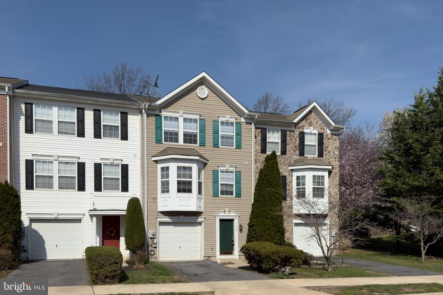 Move-in ready and ideally located in the in Park Overlook! This spacious three-level garage townhome offers comfort, flexibility, and convenience just steps from Pangborn Park and its scenic lake. Freshly updated with new carpet, laminate flooring, and fresh paint throughout, the home welcomes you with a bright and open main level featuring a large living room with a charming bay window. The expansive kitchen includes an island, ample cabinetry, and a slider leading to the backyard patio—perfect for everyday living and entertaining. A convenient powder room completes the main level. Upstairs, the primary suite impresses with vaulted ceilings and a private en-suite bath featuring a soaking tub, separate shower, and dual vanity. Two additional bedrooms and a full hall bath provide versatile space for family, guests, or a home office. The finished lower level adds even more flexibility with a bonus room ideal for an office, guest space, or potential fourth bedroom, along with an additional full bath and laundry. HVAC (2021), Water Heater (2025). Located just around the corner is Pangborn Park, offering picnic shelters, restrooms, and beautiful blooms in the spring. A walking and jogging path connects to Fairgrounds Park, where you’ll find a rec center with fitness room, playgrounds, pavilions, outdoor gym equipment, and courts for skating and basketball. The path continues to a dog park with separate areas for large and small dogs, along with fields for softball, baseball, soccer, and a volleyball court, making it easy to enjoy the outdoors and stay active. Easy access to shopping, dining, and major commuter routes—making this home the perfect combination of comfort and convenience.
