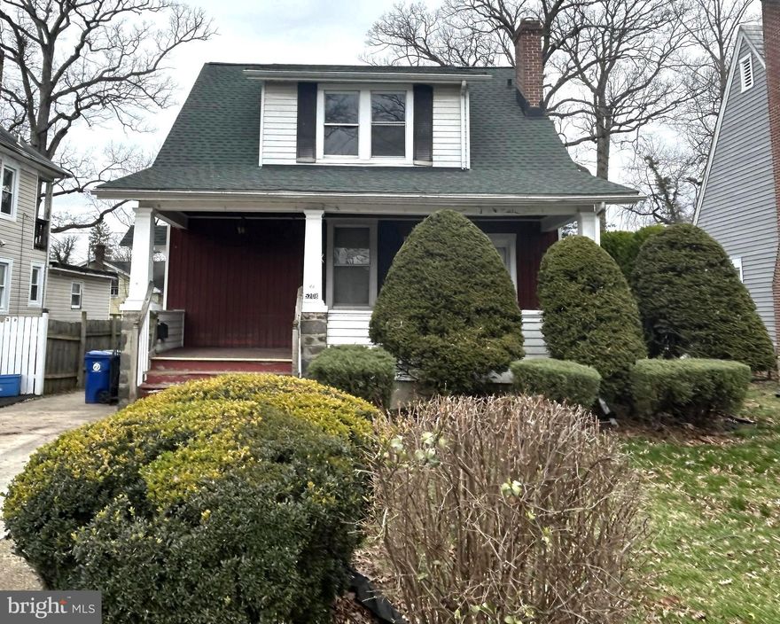 Duplex in Howard Park features two 2 bedroom units, a finished basement with a full bathroom, large yard with a garage, covered front porch, concrete driveway and more.