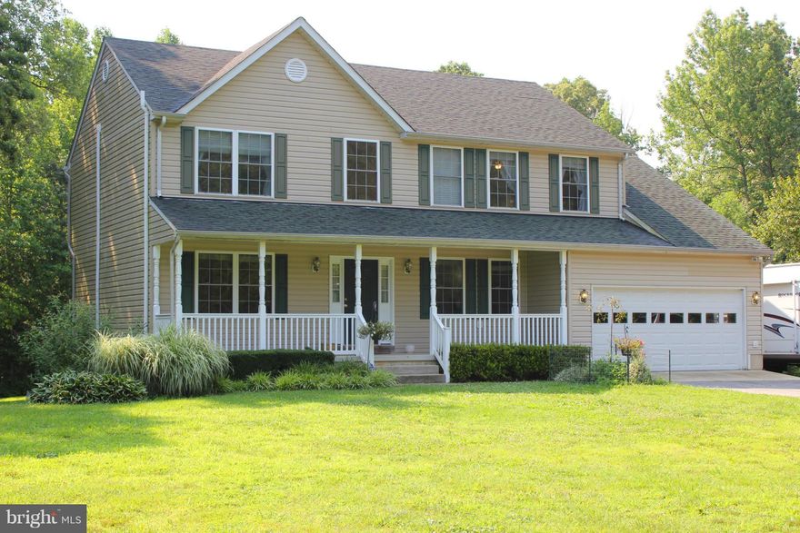 Gorgeous remodeled home on private, wooded 12+ acre lot! Open Floorplan with Gleaming Hardwd Floors. Bright kit with stainless appliances, stunning granite and ceramic tile. Finished walk-out basement with Full Bathrm, Large Master Suite with walk-in closets, Master Bath has double vanities, soaker tub and shower. Large deck overlooks cleared, flat backyard. Pride in ownership shows. Impeccable.