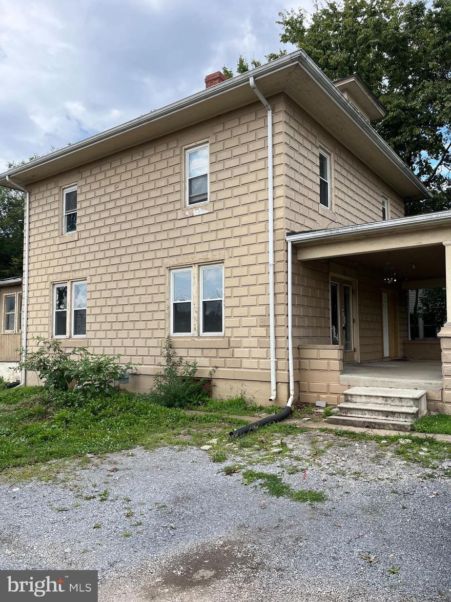 First floor unit in duplex. Convenient to stores, restaurants and schools. Features, 1 bedroom, 1 bathroom, all original hardwood floors, Large living room, large kitchen with room for table, spacious bedroom, new vinyl windows with screens, large enclosed back porch, great for storage and covered (shared) front porch. ALL UTILITIES PAID BY OWNER, except cable and trash. Tenant must pay for cable and have trash service weekly. Tenant must provide window A/C units if  desired.