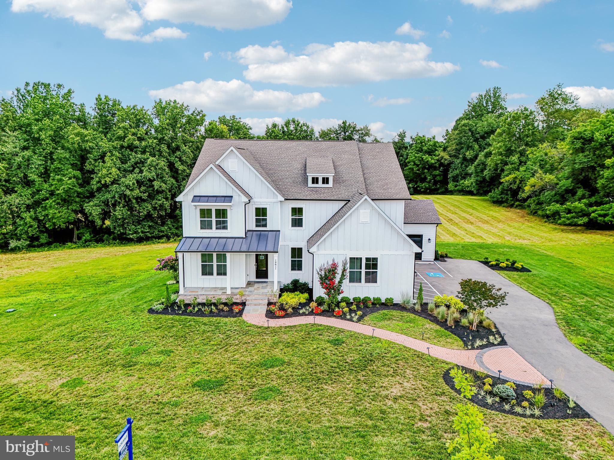 ***Brand new model home that sits on 3.75 acres!!!*** FINAL OPPORUNITY FOR THE HAMPTON FLOORPLAN! **Home will be available for a Quick move in**” Country meets luxury living on this large private homesite, with just over 6,000 total sqft, including 9 foot ceiling finished, walkout basement, and 4 car garage. The Hampton features an extensive grand 2-story foyer, formal dinning room, tray ceilings, and fireplace. The chef's kitchen includes a double oven, stainless steel appliances and walk-in pantry. Basement includes a finished rec room, hobby room and full bathroom. Price listed is for finished home, without furniture.