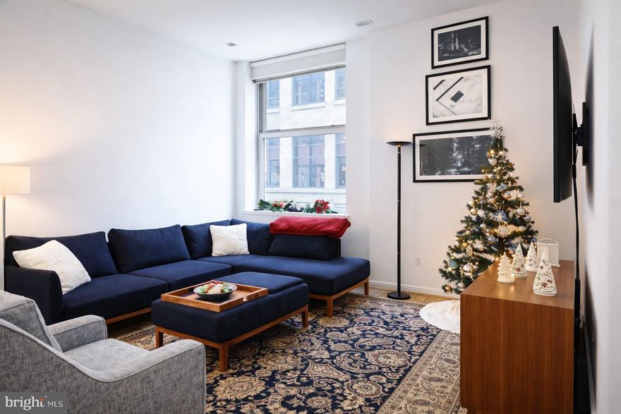 Welcome to this beautiful and spacious one-bedroom residence featuring rich hardwood floors and an elegant marble entryway. The thoughtfully designed layout offers a formal dining area, along with a custom granite desk—perfect for a dedicated work-from-home space. Enjoy abundant closet storage throughout the home.
The chef’s kitchen is appointed with granite countertops and stainless steel appliances, ideal for both everyday living and entertaining. A front-loading washer and dryer are conveniently located in the unit.
All of this is set within a prestigious five-star amenity building offering a state-of-the-art fitness center, 24/7 concierge service, and direct access to Suburban Station, making commuting effortless. Residents enjoy a stunning rooftop terrace and an unbeatable location just steps from world-class museums, shopping, and dining. Best of all , this unit includes one car parking!!!!