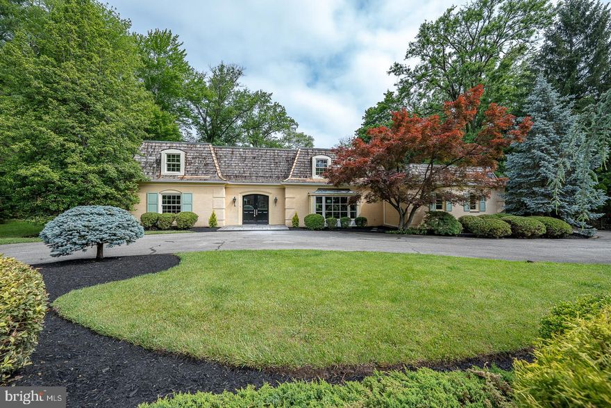 Welcome to 4103 Laurel Dr in Lafayette Hill!  This 5 Bedroom, 3 full, 2 half bathroom, 4910 sq ft, French Colonial has been COMPLETELY RENOVATED and sits on a stunning .74 acre lot. The 2 story entry, flanked by the formal living and dining rooms, welcomes you into the home.  The spacious kitchen with breakfast area offers tons of storage and work space with views of the lovely grounds.  The cozy family room features  a stone accent wall with a fireplace, and sliders to the back patio.  A den/office, laundry room, and 2 half baths complete this level.  Upstairs, the sizeable primary bedroom suite features ample closet space and a full ensuite bath with a double vanity, walk-in shower and soaking tub.  Additionally, there are 4 more bedrooms, one with a full ensuite bathroom and an additional full-hall bathroom.  Enjoy the mature manicured grounds from one of the rear patios.  Located in the Colonial School District.  Close to parks, restaurants, and shopping. Come see this FABULOUS HOME for yourself!