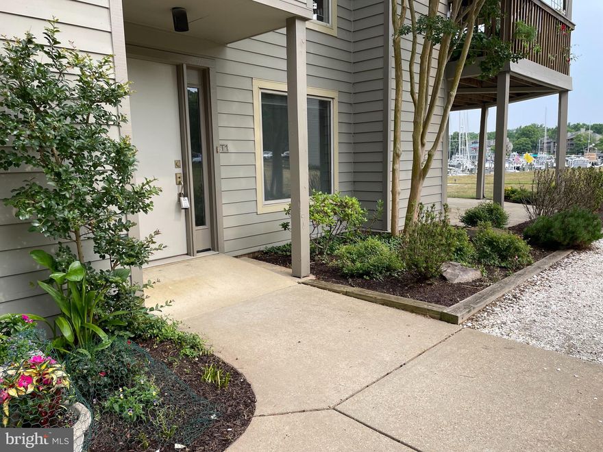 BACK ON THE MARKET. Buyers home sale just fell through so their loss could be your gain. Welcome to this updated first floor end unit condo in the desirable Chesapeake Harbour Marina in Annapolis. This sun drenched condo is one of a small number of units in the development with no steps into the first floor unit and is handicapped accessible.  Overlooking the Marina you can sit on your oversized patio and watch the boats come and go. Located at the quiet end of the marina away from the restaurant, you will enjoy the activity without being disturbed by the noise. The open floor plan lends itself to entertaining and the square symmetrical rooms makes it feel even larger. Come on out to our Open House Sunday June 25th from 1 to 3pm.