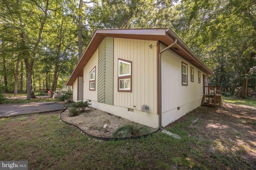 Welcome to 6 Brandywine Drive. This charming home is located in the heart of Ocean Pines, just minutes from the Ocean City beach. Inside you will find an open living area with vaulted ceilings, a wood burning fireplace, a kitchen with new stainless steel appliances and a screen-in porch.  With so much potential to be your next home or rental property, this 3 bedroom, 2 bath home is ready for its next journey.