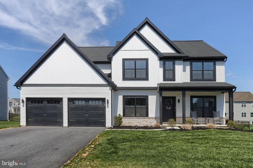 **OPEN HOUSE scheduled  Saturday April 25, from 1-3 PM**
Welcome to 504 Breezewood Lane—where luxury, comfort, and thoughtful design come together in this exceptional “better than new” home located in the sought-after Summer Layne community.
Built in 2024 and meticulously upgraded throughout, this 5-bedroom, 3 full bath home offers almost 3,500 square feet of beautifully curated living space designed for both everyday living and elegant entertaining. From the moment you arrive, the home’s Craftsman-inspired exterior—with striking black-trim windows, vertical siding, stone apron and a welcoming front porch—sets the tone for what awaits inside.
Step through the front door and experience an inviting, light-filled interior featuring 9-foot ceilings, luxury vinyl plank flooring, and an open yet functional layout. A private study provides the perfect work-from-home space, while the formal dining room with its stunning wood coffered ceiling creates an ideal setting for gatherings and special occasions.
The heart of the home is the impressive great room, where 10-foot ceilings, rustic wood beams, and a focal centered fireplace with floor-to-ceiling stone surround and detailed batten board create a warm atmosphere. The adjacent gourmet kitchen is truly a chef’s dream—featuring quartz countertops, a dramatic waterfall island, high-end soft-close cabinetry, an eye-catching custom range hood, convenient pot filler, and top-of-the-line appliances, including wall oven, and “Smart” refrigerator perfect to watch or listen to your favorite programs/music from the comfort of your island stools. 
A few steps away, a beautifully designed butler’s pantry adding extra cabinetry, with beverage refrigerator and wine storage adds both function and style. 
The main level also offers a highly desirable first-floor bedroom with access to a full bath—perfect for guests or multigenerational living—as well as a spacious walk-in pantry with solid wood shelving, thoughtfully designed mudroom with custom wood wainscotting and bench with cubbies with access to the expanded 2 car garage.  
Upstairs, a versatile loft-style recreation room provides additional living space for gathering, relaxing, or entertaining. The primary suite is a true retreat, highlighted by a tray ceiling with ambient rope lighting, and a spa-like ensuite bath featuring a deep soaking tub, walk-in tile shower, and an expansive custom California closet complete with an abundance of shelving, soft close drawers and multi-level rods.  Truly exceptional!  Three additional bedrooms, all generously sized with ceiling fans, walk-in closets, and a well-appointed hall bath complete the second level.
Step outside to enjoy the fenced backyard, stamped concrete patio, and added storage shed—perfect for outdoor living and entertaining.
Every detail in this home has been carefully considered, offering buyers a rare opportunity to own a move-in ready luxury home without the wait and higher cost of new construction. Sellers are relocating so Sellers’ loss is Buyers’ gain!  You can NOT build this home with all the upgrades at this price!  
 Additional outstanding features of this property include: Dual HVAC systems (thermostat for 1st AND 2nd floors), Upgraded/75 gal. gas H2O heater, Custom cellular shades throughout with darkening panels in the bedrooms, classic black window trim with upgraded exterior elevation, upgraded hardware throughout, including kitchen/bath cabinetry, and doors. Undercabinet lighting and upgraded light fixtures, top of the line appliances which convey,  bath rough-in located in full basement, and more! 
 Convenient location close to shopping, entertainment, schools, and minutes to Hershey Med Center, VA, and Good Sam hospitals.
 A perfect home for buyers seeking luxury, comfort, and convenience in a welcoming neighborhood within the Palmyra school district. Don’t miss the opportunity to make this home yours!