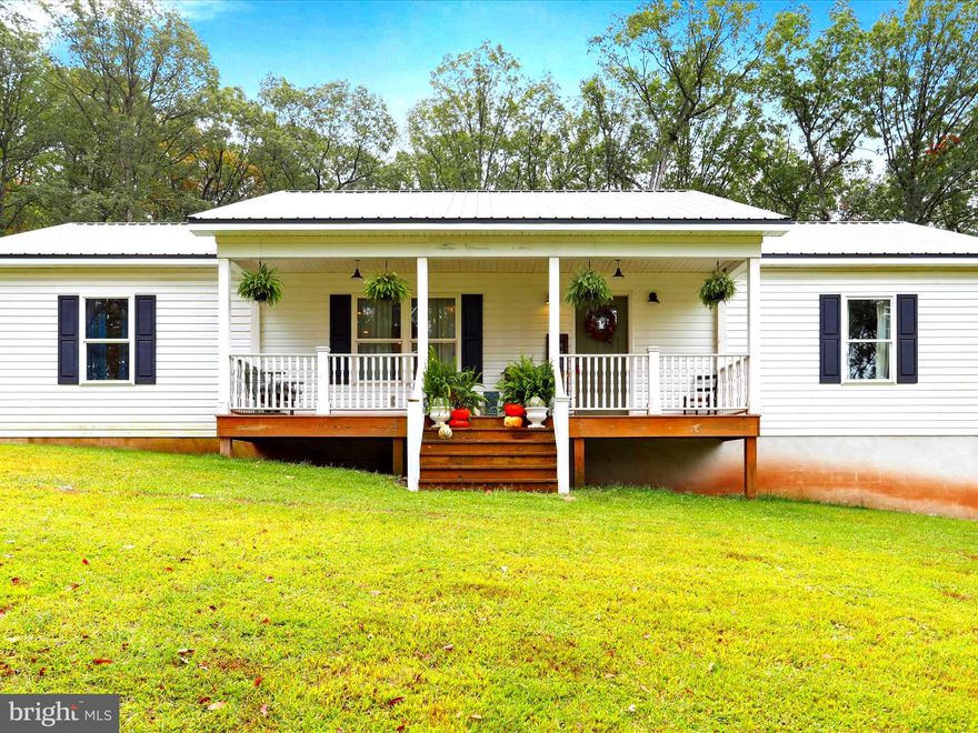 Perfect country living awaits in the highly sought-after Bristol Springs subdivision in Slanesville, WV! This 4-bedroom, 2-bath ranch-style home, just 6 years young, offers modern comfort with a spacious open floor plan connecting the kitchen and living room—ideal for today’s lifestyle. A nice-sized laundry room on the main level adds everyday convenience. The full basement is insulated, wired, and plumbed for an additional bath, making it ready to be finished to suit your needs. Nestled on 6 acres across 3 lots, this property provides privacy, wooded views, and plenty of space to enjoy the outdoors. A true blend of tranquility and modern living! This sale consists of Lots # 50-52 in Bristol Springs totaling 6 acres. House sits on Lot 51.