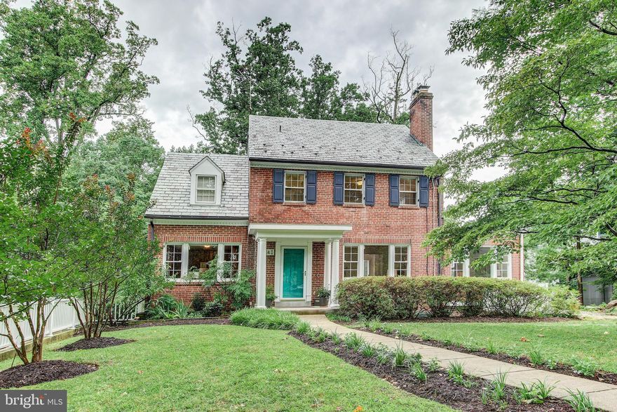 Enjoy the convenience of city living while residing on a country lane! Walk to shops and restaurants ( just 7/10th of a mile to Connecticut Ave) from this handsome Colonial located in a park like setting  off Western Avenue and just steps to bus! This stately residence was built in 1940 and is situated on one of the larger lots in Chevy Chase. Move right into this 4 level well maintained and updated home with an open floor plan and bright exposure to the verdant views.  The main level features a living room with fireplace opening to a family room and dining area with an exit to a charming screen porch with wainscoting. To the left of the entry  is a charming paneled den with built in shelving, closet, and powder room just perfect for home office or guest room. There are two staircases to the finished lower level.  The newly renovated table space kitchen features granite counters and stainless appliances with room for a small table and exit to a large elevated terrace perfect for al fresco dining.   The spacious rear yard not only affords  beautiful treed views but a level area for play and gardening.The second level includes a large master bedroom with a newly updated bathroom en suite and ample closet space.  There are two other bedrooms and a newly renovated hall bathroom and linen closet and storage closet.  There are lovely original hardwood floors on main and second level. Steps up to top level and the 4th bedroom or  spacious home office.  There is plumbing avail on that level for another bathroom.  There  are three storage closets in the eaves.The lower level is above ground in the back with an exit to  a patio and the yard.  This level has been finished off to include a family room with ceramic tile floor, recessed lighting, and powder room.  There is also an exit to the garage, utility room, and sunny laundry room with  handy sink. Please see the extensive list of improvements available at the residence.