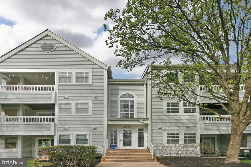 Welcome to 8330 Montgomery Run #L—a beautifully updated top-floor 2-bedroom, 2-bathroom condo in the desirable Village of Montgomery Run. Bathed in natural light, this move-in-ready home offers stylish upgrades, vaulted ceilings, and a low-maintenance lifestyle in a prime Ellicott City location. Step inside to discover a welcoming foyer with a convenient coffee counter and pantry, perfect for morning routines and additional storage. Just beyond, the updated kitchen features new cabinets, granite countertops, tile backsplash, and new appliances. The separate dining area offers a natural flow into the spacious living room with vaulted ceilings, and from there, sliding glass doors open to a private balcony—ideal for relaxing or entertaining. The primary suite is a true retreat, offering vaulted ceilings, a walk-in closet, and an en-suite bath. A second well-sized bedroom, updated hall bath, and a new in-unit washer and dryer add to the home’s everyday comfort and convenience. Recent improvements include new tile flooring in the foyer and kitchen, attractive laminate wood flooring throughout, and fresh paint. The home also includes a reserved parking space, and the secured building entry with an intercom system provides added peace of mind. Residents enjoy access to desirable community amenities, including a swimming pool, clubhouse, tot lot, and walking paths. Ideally located near shopping, dining, and major commuter routes, 8330 Montgomery Run #L blends modern comfort with everyday convenience—making it a wonderful place to call home.