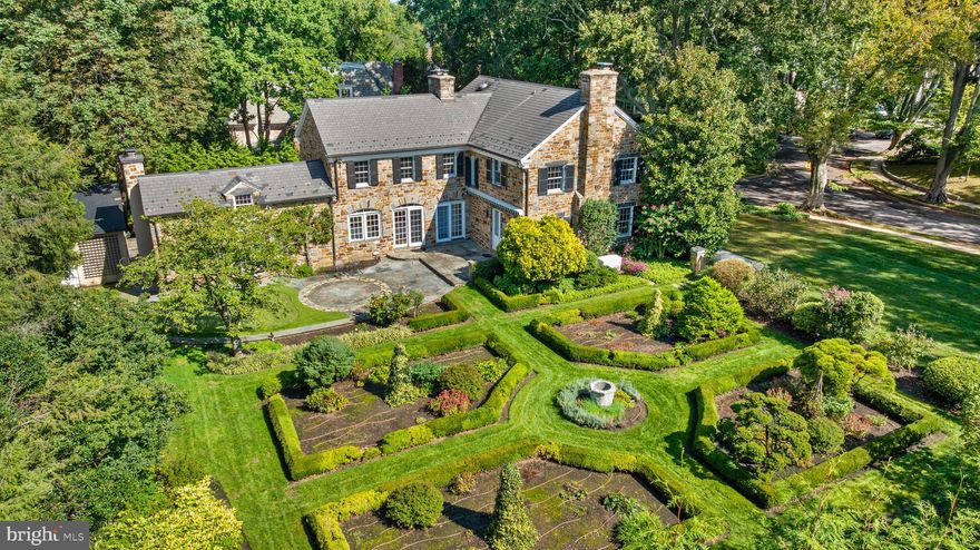 Live authentically. Tucked within the coveted Pinehurst community, this endearing 1937 stone estate sits gracefully amidst its formal English parterre gardens—a sculpted landscape defined by symmetry and precision. Rich with culinary herbs and traversed by grass paths inviting exploration. Thoughtful plantings that provide an abundance of color through every season... the bounty of beauty is always blooming with peonies, ivy, roses and hedges connecting each section with intention. Live in your own landscape painting. Feel worlds away... the internal story of this magical property must be experienced. Garden gate by David Hess. A sprawling bluestone patio extends from the kitchen, offering a gracious setting for alfresco dining beneath the stars or quiet moments overlooking the putting green. Enduring interiors by Stiles Colwill. Arched doorways, refined millwork, and attentive architectural details evoke aesthetic artistry. The inspirational cooking space was specifically designed to handle two chefs at once! Brilliant. A primary suite that will transform your nocturnal journey as you gaze into the gardens before falling into restful slumber. A distinguished library provides sanctuary for reads and curiosities. From every vantage, serene garden vistas transform the rhythm of daily life into something poetic. This address consists of two parcels, Lot 31 and Lot 32 on the same deed. Close in proximity to everywhere you need to be. Cultivate your existence. The art of uniting human and home.