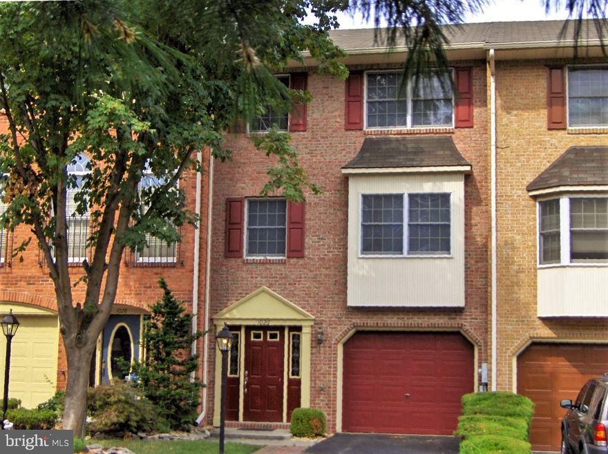 This contemporary townhome is located in beautiful Northgate Townhomes in the North end of Hagerstown.  Within easy walking distance to schools the community features numerous amenities including an in-ground swimming pool, walking trails, tennis courts, professional landscaping, playgrounds and more.  The large rear deck overlooks a private back yard and common grounds with mature landscaping and large growth trees.  The main level patio offers privacy located just off the family room.
Step through the front door and you're greeted by a spacious tile entry foyer that leads to the main level family room.   The family room offers tile floors, corner gas fireplace and sliding glass doors to the covered rear patio.  You'll find a convenient half bath and 1-car garage on this level.
On the 2nd level of the home you'll find a spacious open floor plan that includes the eat-in kitchen, formal dining room and a large living room with bump-out bay window.  The kitchen features white cabinets, stainless steel appliances, large pantry, table space, breakfast bar and sliding doors to the rear deck, perfect for outdoor grilling.   This level also offers a convenient half bath.
On the third floor you'll find the master-suite and 2 additional bedrooms.  The master-suite includes a contemporary ceiling fan, walk-in closet with organizers, full bath and new paint and flooring.  The 3rd level also features a shared hall bath and a bedroom level laundry room complete with washer and dryer.
Pets are considered on a case-by-case basis and will require an additional deposit and pet addendum.  No smoking in the rental unit.  The unit is available immediately.  Contact Julie or Michael for application and rental process.