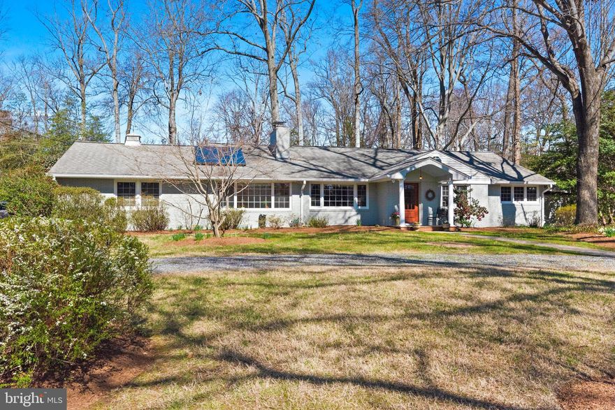 Expansive well maintained and updated one level home in water privileged Amberley! Total finished square footage approximately 3800+. Welcoming foyer leads to formal living room with wall of windows and lovely full wall brick fireplace.  Recently refinished hardwood flooring throughout living room, dining room, great room, and 3 bedrooms.  Kitchen was renovated in 2008 with new cabinetry, appliances, granite counters, gas range . Great room off the kitchen is 28' x 18' with brick fireplace, sliders leading to private back yard with screened porch and gorgeous heated pool, plus a hot tub.
The home has 5 bedrooms (4 on main level, 1 in LL), and 4 full baths (3 on main level, 1 in LL). Main level baths renovated in 2013 (primary bath has heated flooring).  The fully finished lower level has a 31' x 16' room with another brick fireplace, plenty of space for couching it, workout area, whatever you need. There is a bedroom and a full bath in lower level as well. The workshop /flex space has room for a desk, a walk in cedar closet, plus another large storage closet.  Solar powered water heater (with electric back up). The inground pool also well maintained. The fuel for the pool heater is propane (owned 500 gallon propane tank). 
Oversized two car garage with attic storage space, stand alone freezer.
Generator with dedicated electric panel. 
Amberley is Special Taxing District; and the HOA is voluntary ($75 per year). 3 community piers with 45+ boat slips, kayak and dinghy racks, boat ramp.
Note: main level family room fireplace has stainless steel liner; the other two do not and are sold as is.