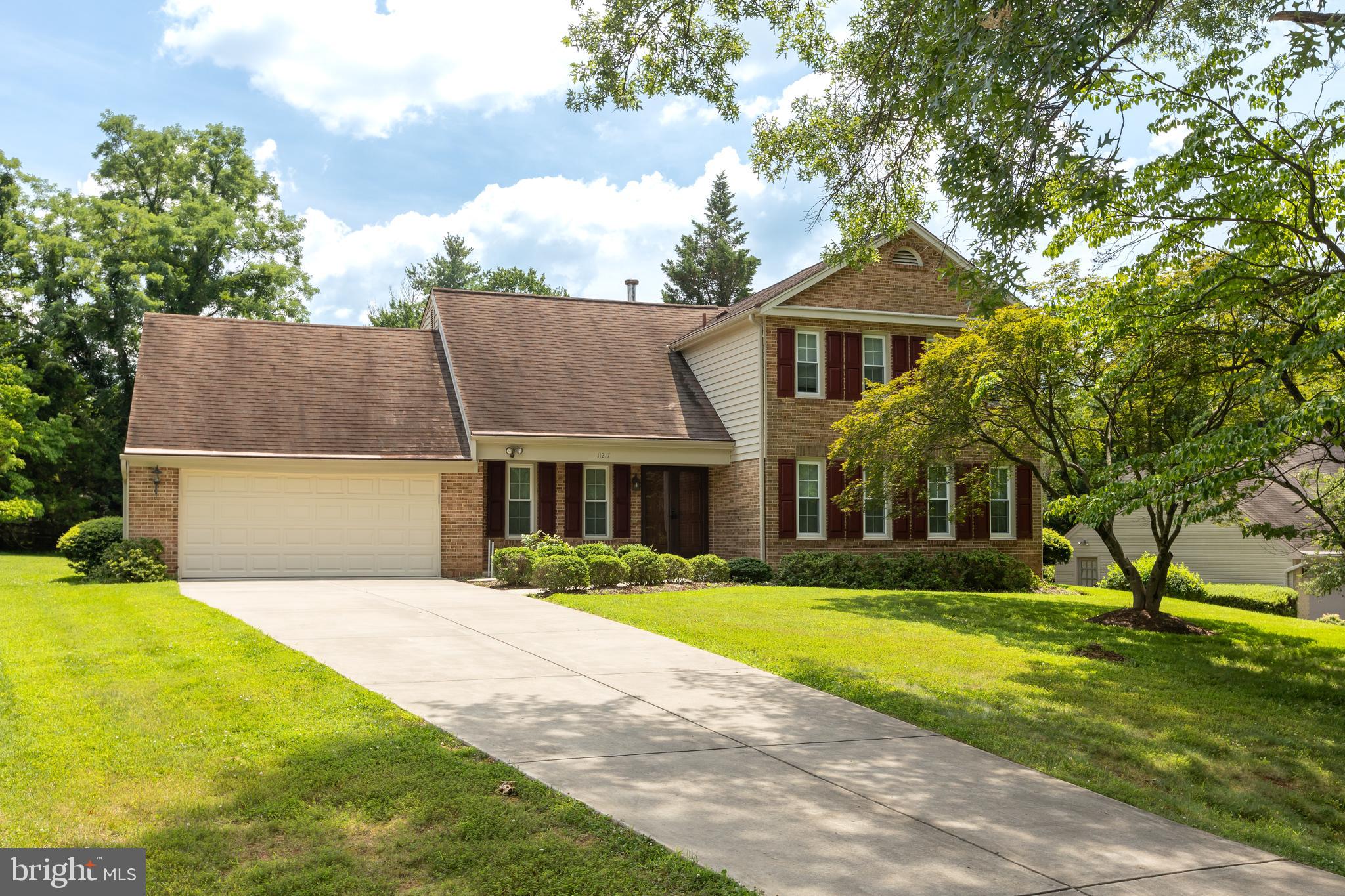 Welcome to this stunning 4-bedroom,3.5-bath Colonial features a brick front, PLUS a den Home in a wonderful Churchill HS location. Engulfed in sunlight! Sited on one of Potomac's prime locations on a big premium lot. hardwood flooring on both the main floor and the second floor. Formal living room, separate dining room and separate home office. The dining room is accessible to the kitchen, making it great for celebrations or a simple dinner. Unique family room with brick fireplace adjacent to the kitchen, sliding doors opening to the backyard. Kitchen with stainless steel appliances, pantry closets, ceramic flooring, and overlooking the backyard. Upstairs, you'll find four generously sized bedrooms, with the owner's suite featuring a separate sitting area. Master Bedroom Suite with two walk-in closets. Spacious second, third and fourth bedrooms with big closets. Hallway full bathroom with bathtub and ceramic flooring. The convenience of the laundry room on the main level, just near the garage on the main level. The large, partially finished basement offers versatility with an additional 5th bedroom, full bathroom and lots of storage space! and a utility room. Near parks, shopping centers, restaurants, public and private schools, library, religious facilities, access to public transportation and I-270/495. Widows replaced 2025, fresh paint. Home is being sold as-is.
