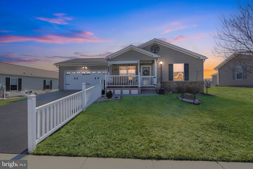 Largest Model in Desirable 55+ Community – Upgraded Throughout! Welcome to Douglass Village, one of Douglassville’s most sought-after 55+ communities in Pennsylvania. This is the largest model offered in the neighborhood, delivering spacious, low-maintenance living with premium upgrades at every turn. From the moment you step onto the oversized front porch and enter this immaculately maintained home, you’ll appreciate the open, airy layout and thoughtful enhancements throughout. The spacious front living room flows seamlessly into the beautifully updated eat-in kitchen, featuring: Quartz countertops throughout, large center island, soft-close, upgraded cabinetry with abundant storage, recessed lighting,
solar tube skylight for natural brightness. Just off the kitchen, enjoy an expansive covered and extended rear deck,  perfect for morning coffee or evening gatherings. A flexible second living space with a cozy electric fireplace provides additional room for entertaining, hobbies, or relaxation. The primary suite is a true retreat, complete with large walk-in closet, stunning en-suite bath with ceramic tile and walk-in shower. Upgraded finishes and wall treatments. Additional highlights include luxury vinyl plank flooring,
200+ amp electrical service, extended and heated garage, upgraded ceilings and designer touches throughout. The HOA takes care of common area maintenance, lawn care, trash service, and snow removal,  allowing you to enjoy truly carefree living. Residents also have full access to the community clubhouse, featuring a fitness center, game room, banquet space, heated outside pool, library, and a full calendar of social activities. Conveniently located just minutes from shopping, dining, and Route 422 for easy access to the Philadelphia Premium Outlets and beyond. This home offers the perfect blend of space, upgrades, and lifestyle — all you have to do is move in and enjoy!