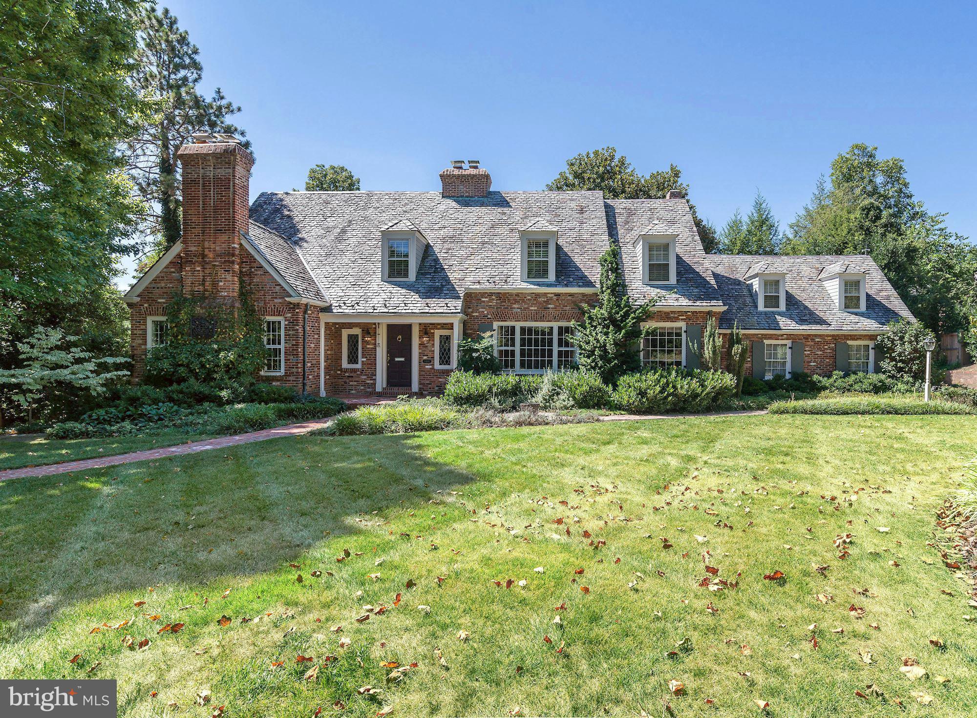 Incredibly enchanting w/tremendous curb appeal.1st&2nd fl MBRs!Prime spot in prestigious Kenwood!Much larger than appears from street-5700 fin sf.MRB+3 addl BRs up.Full of character&detail-arched doorways,beautiful moldings,french doors,4 FP.Spa-like Master Bath.Kit/Fam Rm,1st fl Lib.Great low lev w/fab living space&au pair ste.Gorgeous gardens&yard.2 Car Gar.Cap Cres Trail,shops,Somerset!