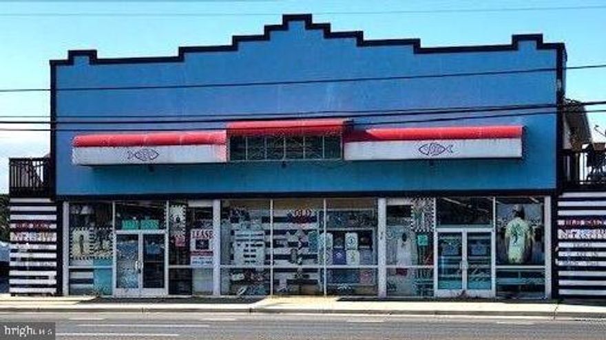 Retail Store with  Coastal Hwy frontage and abundant parking. 4 -  2 Bed/1 Bath units on upper level.  $1,000 rent month to month.  Great development opportunity for a drive thru business on this property. Property available for purchase.