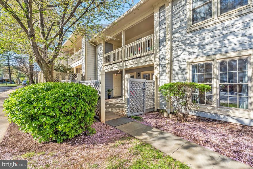 Absolutely fabulous ground level garden-style condo with a fully fenced private courtyard in the heart of Germantown! This incredibly spacious & bright, immaculate two-bedroom unit with beautifully updated kitchen and bathrooms offers an open living & dining area with a wood burning fireplace, built-in bookcases, & recessed lighting galore, a large primary bedroom with gorgeous en-suite bath, huge walk-in closet & direct access to the flagstone patio. A second large bedroom with walk-in closet awaits on the other side of the condo along with a second full bathroom, plus an in-unit washer & dryer, private extra storage, and plenty of free parking! Enjoy being minutes away from parks, restaurants, shopping, & groceries, and an easy walk to playgrounds, tennis courts, & the Waters Landing community pool. Exceptionally close to 270 and only a few miles to the Germantown Marc Station!