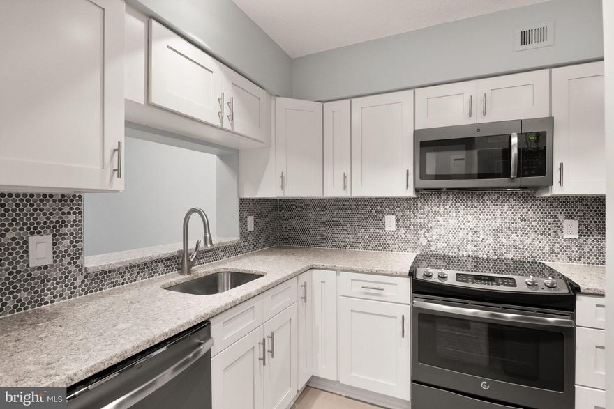 Welcome to this beautiful one-bedroom, one-bathroom condominium in Crystal Park, offering two parking spaces, a covered balcony with serene tree-lined views, and a dedicated storage unit. Ideally situated in the heart of Crystal City, this sunlit home has been thoughtfully updated with designer touches, including luxury vinyl plank flooring, fresh paint, and a stylish kitchen featuring stainless steel appliances and an elegant tiled backsplash. Crystal Park Condominiums boast an array of premium amenities, including 24/7 concierge service, a fitness center, sauna, club room, party room, and a spacious outdoor swimming pool with a newly renovated pool deck. Residents enjoy unparalleled convenience with easy access to Metro, buses, and Capital Bikeshare. With Amazon’s HQ2, the Pentagon, Capitol Hill, and some of the city’s finest dining and shopping just minutes away, this prime location offers the perfect blend of urban living and modern comfort.