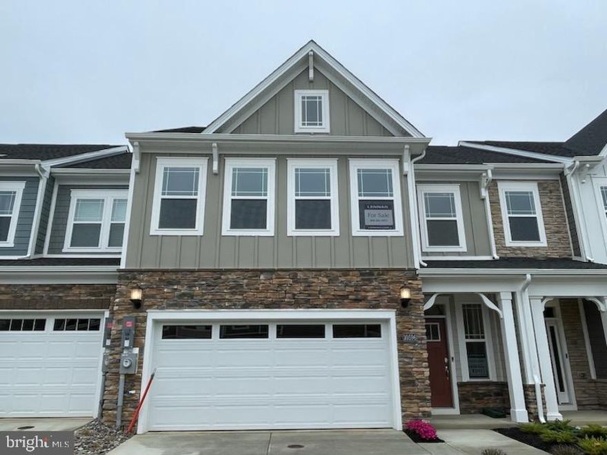 Active 55+ | St. Charles – Parklands | Interior-Unit Villa | Abigail Craftsman Interior (Lot K101) | New Construction | May 2026 Move-In!

Welcome to this stunning new construction Villa located in the highly sought-after 55+ community of St. Charles – Parklands in White Plains, MD.

This thoughtfully designed Abigail Craftsman interior model features 3 spacious bedrooms, 2 full bathrooms, and 1 half bath, along with a 2-car attached garage for added convenience.

The gourmet kitchen features granite countertops and stainless-steel appliances that open seamlessly into the main living areas, perfect for both everyday living and entertaining. Wide-plank flooring flows throughout the foyer, kitchen, dining area, and family room, creating a warm and cohesive feel.

The owner’s suite serves as a private retreat, complete with a spa-inspired bathroom featuring granite countertops and a generous walk-in closet.

Enjoy indoor-outdoor living with sliding glass doors that lead to a screened-in porch perfect for morning coffee or relaxing evenings under the stars. A secondary bedroom located off the foyer offers a quiet and comfortable space for guests or family.

Residents enjoy a true low-maintenance lifestyle, with the HOA covering all landscaping and snow removal, including the driveway.

The one-of-a-kind clubhouse offers an impressive array of amenities, including a fully equipped fitness center, private office space, a stylish bar area, pool tables, and dedicated spaces to relax and watch the big game. The clubhouse also features beautifully designed bathrooms with showers for added convenience.

Outdoor amenities are just as exceptional, featuring an Olympic-size pool, grilling stations, a cozy fireplace lounge, pickleball courts, and open spaces for concerts and community events, plus so much more.

Take advantage of the benefits of new construction living, including modern finishes, energy efficiency, and a vibrant, active-adult lifestyle.

For a limited time, the builder is offering a $20,000 incentive toward closing costs when using the preferred lender, making this home an even more exceptional opportunity.

Don’t miss this incredible opportunity; schedule your private showing today!