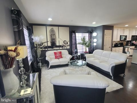 Photo of 9301 Silver Charm Drive, RANDALLSTOWN, MD 21133 (MLS # MDBC2150858)