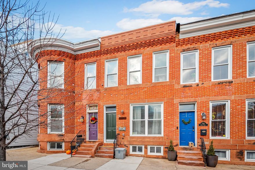 2012 New Renaissance/John Bolster renovation with modernized updates. Expansive main level with original hardwood floor, exposed brick, and custom joist/drywall work in the living room. Kitchen opens up to living room with custom wood breakfast bar. Powder room off of kitchen. Large dining room in the rear, leading out to concrete patio overtop of the attached 1 car garage. 2 beds and 2 full baths upstairs. Exquisite primary suite with vaulted ceilings and custom joist/drywall work. Two closets and double-vanity in ensuite bath. Both upstairs bathrooms tastefully updated with marble tile and upgraded finishes. Balcony off of rear bedroom. Laundry in upstairs hall. Interior access stairwell to wet bar and rooftop deck. Fantastic views from rooftop deck of the water and Domino Sugar sign. Fully finished basement as 3rd bedroom and large utility closet for storage. New main roof (2023), water heater (2024), dishwasher (2024), washer/dryer (2023), garage door (2021). Listing agent is owner.