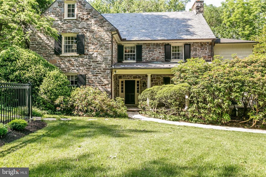 Ruxton Area - rare opportunity to purchase in one of Baltimore's most desirable locations -   This Charming, English-Style, Stone Country Home, offers traditional Old-World Craftsmanship.  Situated on 2.59 acres,  in one of Baltimore County's most desirable locations, this home offers the following:   Lovely Covered Front Porch, Formal Living Room, Gracious Dining Room, Butler's Pantry.   Sun Room with sliding doors to access Stone Terrace,  Great Family Room addition added in 1985 with high beamed Cathedral ceilings, Palladian Windows, extra-large fireplace and extensive Built-ins.    Bonus room off of the Family room could be used as a first floor study, or spare bedroom.   The second floor includes the Master Bedroom with full bath and dressing room, plus two additional bedrooms that share a buddy bath.    An Artist's loft overlooks the family room below.   Third level offers two bedrooms plus another full bath. Lower level has a club room with a fireplace.  An attached two-car garage can be accessed from the rear of the house.  Mature landscaping and an irrigation system help keep the property private and lush.