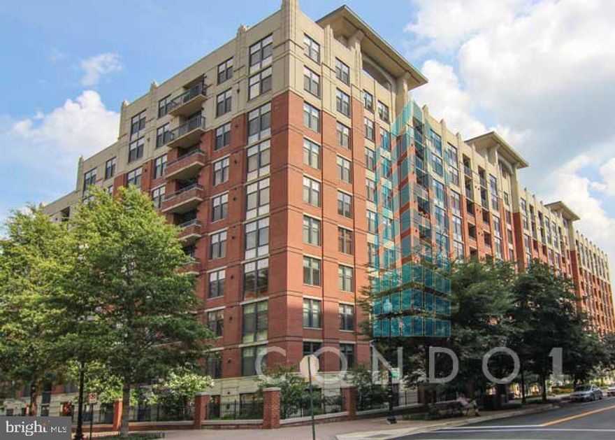 Live in the heart of urban Clarendon! Steps to Metro, Market Commons and all the vibrant eateries & nightlife. Building includes rooftop pool, 21st Century  Fitness center, business center, 24/7 concierge & security & underground parking. Unit features include hardwood floors, gourmet kitchen with SS appliances, luxury bath, private computer niche, custom paint & blinds! Plus- additional storage unit!