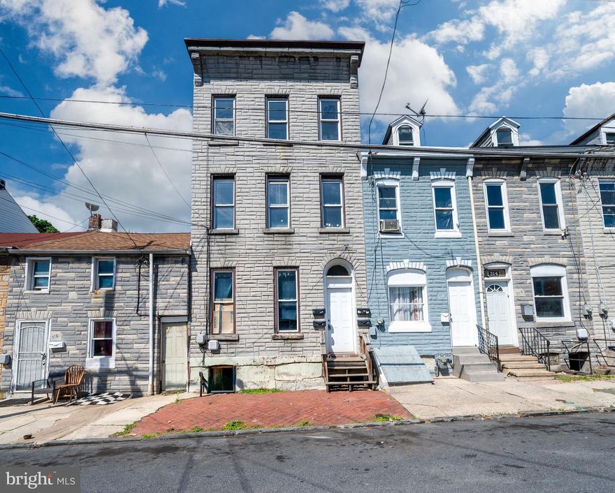 Savvy investors and house hackers — this is the one you've been waiting for. This fully vacant 4-unit at 316 S 8th Street is a blank canvas sitting in one of Pennsylvania's most renter-hungry markets, where 60% of households rent and studios are commanding $1,000–$1,100/mo with 2-bedrooms pushing $1,600–$1,700+ in today's market. Do the math: a light cosmetic refresh — fresh floors, clean walls — and you're looking at a potential gross monthly rent roll of $4,200–$4,500+. Here's where it gets even better — every unit has its own separate electric heat and each tenant pays their own utilities, meaning your operating expenses stay lean and your net income stays fat. No utility bills eating into your returns. A true investor's dream structure. Maximum flexibility too: rent all four and stack income, or move into the 2-bedroom, let your three tenants cover your mortgage AND put cash in your pocket every single month — live for free while building real wealth. The vacancy isn't a problem — it's your power. Every unit is yours to price at peak market rates from day one, no inherited leases, no inherited headaches, just pure upside. In a city where rents have risen nearly 2% year-over-year and demand never sleeps, hesitation is the only mistake you can make. First mover wins here — schedule your showing now before the next investor does.
