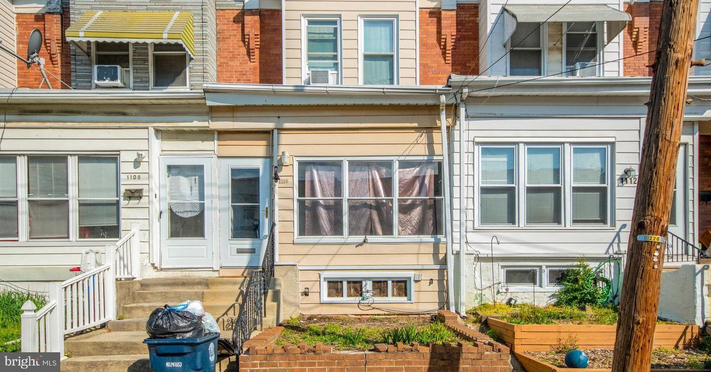 Welcome to 1110 E 11Th St! A charming and spacious interior row home located in the heart of Crum Lynne, PA. This two-story residence offers a comfortable layout with four bedrooms and one full bathroom, providing ample space for families, individuals, or investors. Upon entering, you're welcomed by an enclosed front porch that leads into a generous living room, which easily accommodates both lounging and dining areas. The kitchen is functional and well-sized, offering gas cooking and abundant cabinet storage. A unique feature of the home is a main-level bedroom with direct access to the backyard—perfect for guests or flexible use as an office or playroom.
Upstairs, you'll find three additional bedrooms, each with natural light and closet space, along with a full bathroom that includes a shower-tub combo. The unfinished basement provides extra storage and potential for additional customization. Outside, the property boasts a large fenced-in backyard, ideal for outdoor entertaining, gardening, or pets.