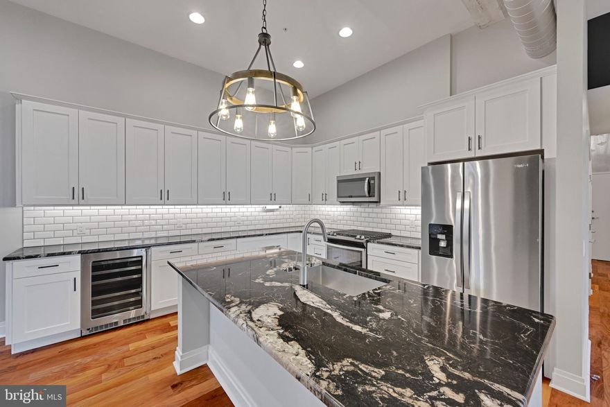 Luxury Living in the Historic Lancaster Press Building

Experience the perfect blend of history and modern elegance in this stunning 5th-floor, 2-bedroom, 2-bath luxury condominium in the heart of Lancaster City. Located in the iconic Press Building, this northwest corner unit boasts 1,672 sq. ft. of open-concept living space, designed for both comfort and sophistication.
Unmatched Features & Design:

-Private balcony overlooking N. Prince Street,
-Dramatic exposed brick walls, concrete columns, and oversized windows with northern and western sunlight,
-Gourmet kitchen with an 8’ granite island, stainless steel appliances, gas range, wine cooler & deep stainless-steel sink,
-Spa-like bathrooms with granite vanity tops, ceramic tile flooring, and a walk-in shower in the primary bath,

Convenience & Luxury Amenities:

 -Spacious closets throughout and front-loading washer & dryer included.
-Two assigned parking spaces in a secured, lighted garage,
-Private storage unit (8’x6’) in the basement,
-24/7 access to a state-of-the-art fitness center,
-Rooftop deck with breathtaking skyline views of Lancaster City,
Prime Location:
Just steps from Lancaster’s finest dining, including 401 Prime and The Belvedere, and a short stroll to Central Market.

Don't miss this opportunity to rent a piece of Lancaster’s history with all the modern comforts you desire.

Schedule your private tour today!

Available for 12 month lease only. Subletting strictly prohibited.

Tenant pays: electric(lights and heat), gas(cooking), cable
Owner Pays: HOA fees (Water/sewer/trash/building amenities) 

NO PETS 
NO SMOKING

All applicants must apply and be pre-approved before showings.

Application fee is $45. Fee covers background and credit check.
Credit score requirement - 750 or above
Monthly income requirement - 3X rent amount or above