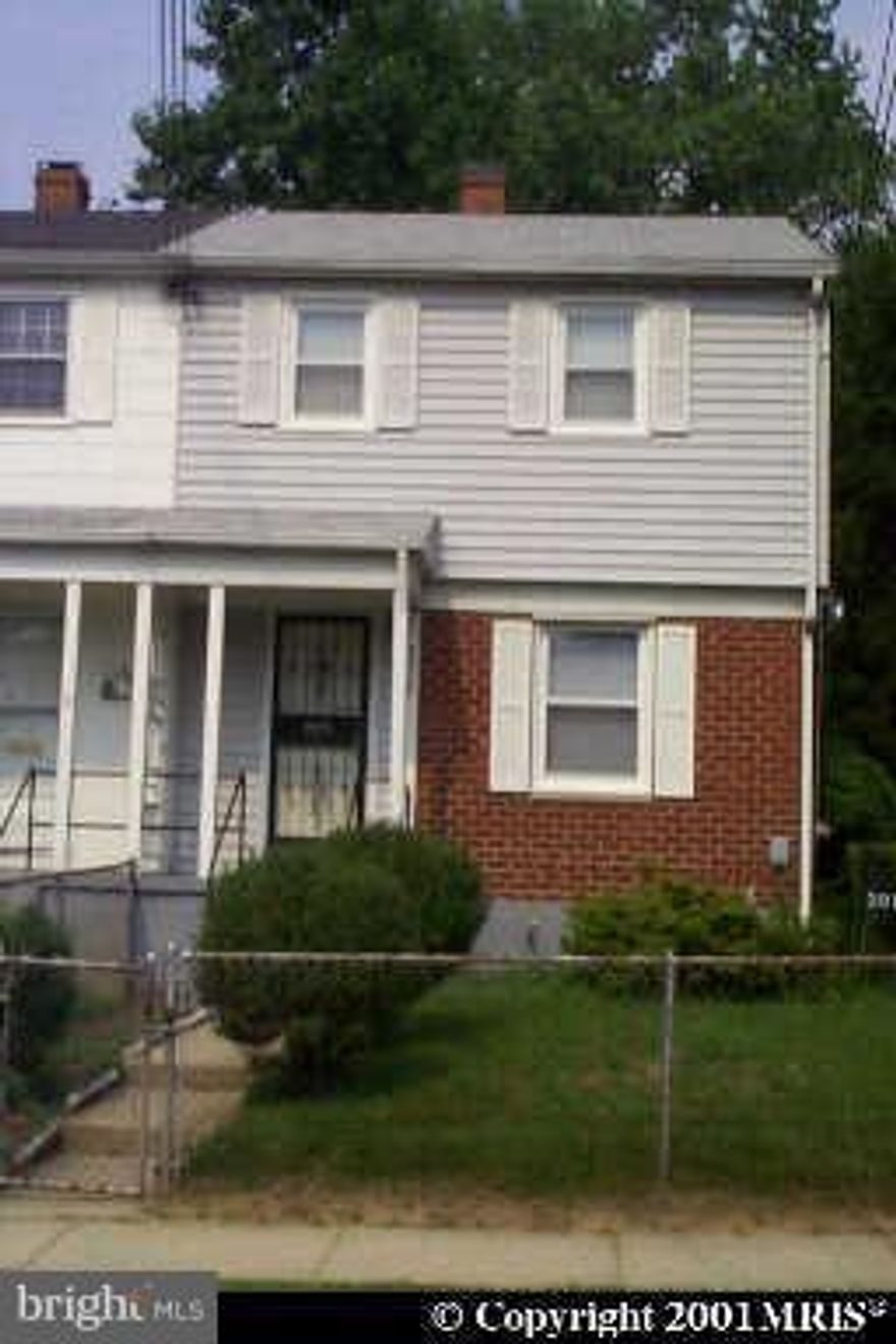 beautifully updated row house. private driveway and large yard for entertaining.