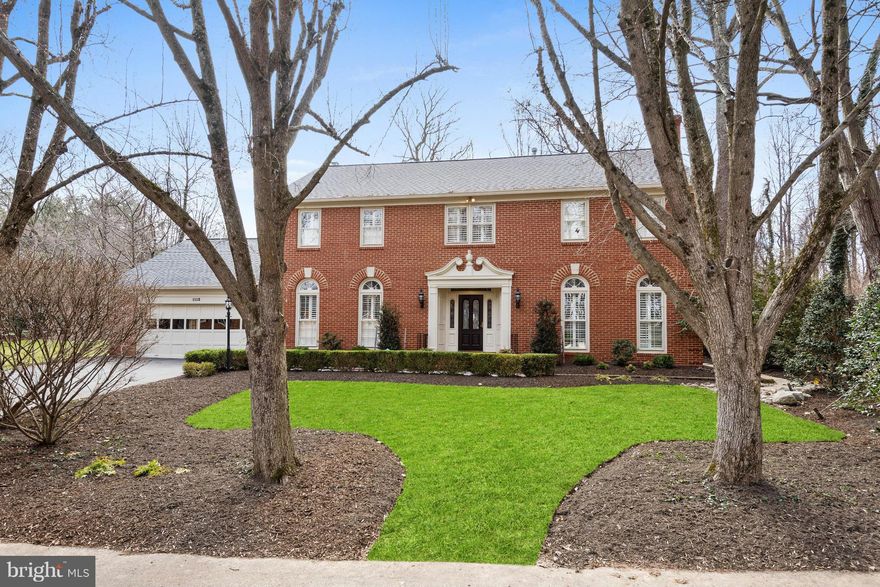 Handsome all brick colonial backing to parkland offering almost 6000 sf of living * Beautifully updated & renovated on all three levels * Top of the line gourmet kitchen opening to family room * Luxury Master Suite * Hardwoods on main & upper levels * Three fireplaces * Private backyard with flagstone patio *  Complete lower level w/kitchenette * Surrounded by acres of parkland with walking paths