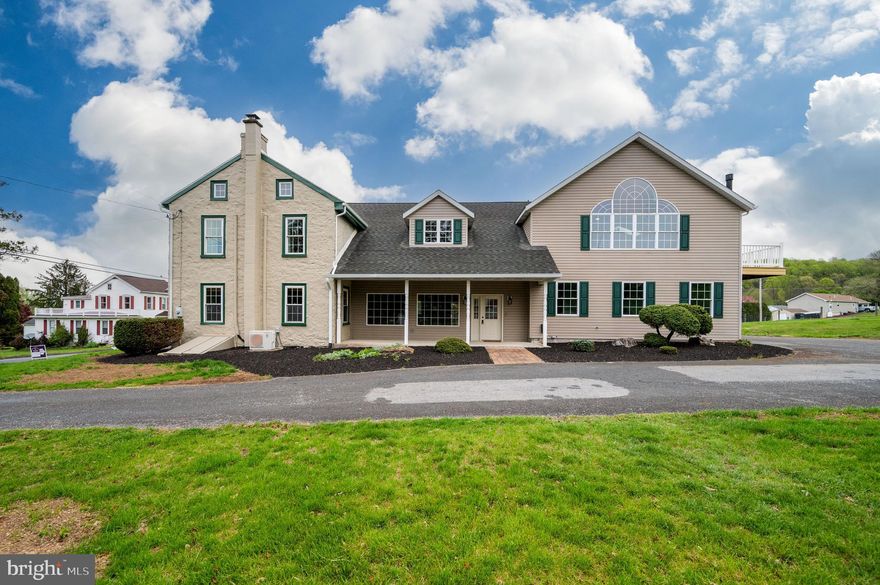 Set in Oley Valley, this beautifully reimagined farmhouse blends timeless character with thoughtful modern updates, offering over 3,700 square feet of living space on 2.22 scenic acres.
From the moment you step inside, you’re greeted by the warmth and charm of the original farmhouse, highlighted by a cozy living room featuring ornate built-ins and a classic fireplace. A spacious main living area provides plenty of room for gathering and entertaining. The open-concept dining and kitchen area is designed for both everyday living and hosting, complete with abundant cabinetry, granite countertops, stainless steel appliances, a tile backsplash, and a large walk-in pantry.
One of the home’s most unique and memorable features is the preserved stone well, exposed in the kitchen floor during the addition—a true conversation piece that adds a touch of history you won’t find anywhere else.
The first floor also includes a generously sized mudroom and a convenient half bath. Upstairs, you’ll find three bedrooms and two full bathrooms, including an impressive 700-square-foot primary suite. This private retreat boasts a stunning Palladian window that fills the space with natural light, a corner propane fireplace, and a fully remodeled spa-like bathroom with a sauna, walk-in tiled shower, and elegant finishes. The suite also features a spacious walk-in closet with laundry, built-in cabinetry, and storage, as well as a private balcony—perfect for enjoying your morning coffee.
The upper-level hallway offers additional flexible space ideal for a sitting area, office nook, or reading lounge. Two additional bedrooms and a full hall bathroom complete the second floor.
Outside, the property shines with 2.22 acres of open land, including a pasture and a spring-fed creek—ideal for animals or simply enjoying the peaceful surroundings. An oversized, heated and air conditioned 3 car garage is located at the rear of the home, providing ample storage and convenience.
With numerous updates throughout and a completed septic test already in place, this home offers both charm and peace of mind—ready for its next chapter.