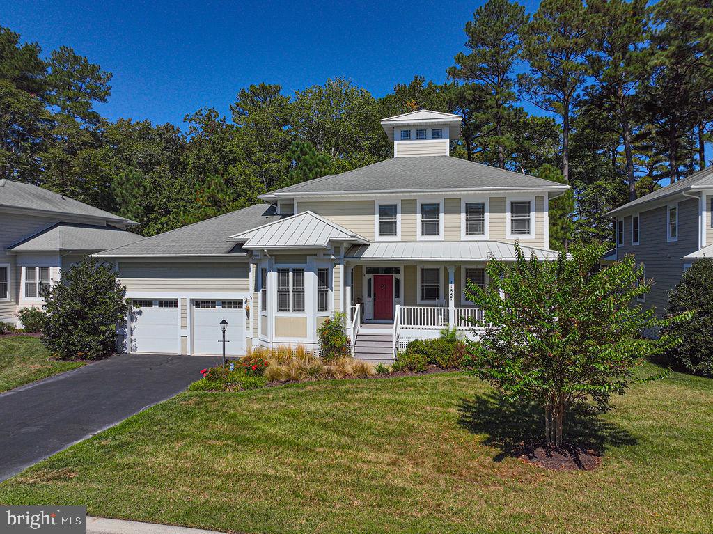 Coastal Contemporary in GlenRiddle – Includes Boat Slip #73
Welcome to this wonderfully crafted coastal contemporary home offering over 3,000 sq. ft. of refined living in the sought-after community of GlenRiddle. Step inside to a grand living room filled with natural light from a wall of oversized windows, anchored by a cozy gas fireplace. The open-concept kitchen flows seemlessly with a spacious dining area, creating the perfect gathering space. The first-floor primary suite is a true retreat with an oversized bath featuring a soaking tub, separate shower stall, and double vanity. From the suite, step out to a screened porch leading to a private rear deck. Additional main-level highlights include a mudroom, office, and two-car garage. Upstairs, you'll find three generously sized bedrooms and 2 full baths, ideal for family & guest.
Bonus Feature: This sale includes Boat Slip #73, located at the end of the “T” dock in GlenRiddle’s central water basin. With constantly moving water, you’ll enjoy the added advantage of minimal hull growth on your vessel—a true boater’s dream. Situated in GlenRiddle, a vibrant neighborhood of over 500 single-family homes, residents enjoy access to world-class amenities including 2 championship golf courses, a private marina, clubhouse, pool, fitness center, tennis and more. Steeped in history, GlenRiddle once stood as the training grounds for legendary racehorses including Man O War & War Admiral. The community has preserved this heritage, most notably by converting the original horse barn into one of the nation's most unique and highly regarded Ruth's Chris Steak House locations-an upscale dining experience that celebrates the property's storied past. This is a rare opportunity to own a stunning home paired with a lifestyle rich in history, luxury, & coastal convenience. A must see-Invest In the Beach Lifestyle.