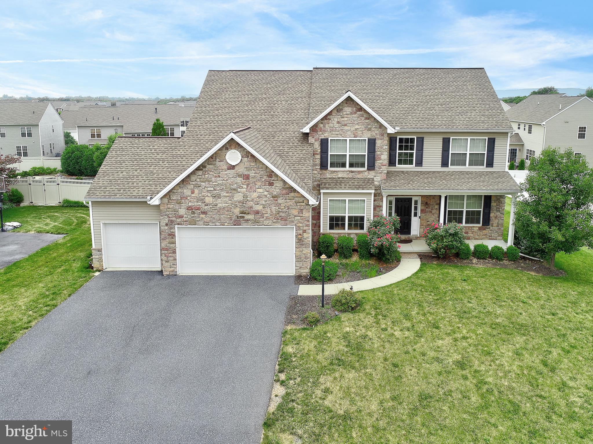 Beautiful 5 BR 2.5 Bath home in Walnut Point. Freshly painted the entire house including the garage. Every one of the 5 large bedrooms comes with a super spacious walk-in closet and large windows for all the natural sunlight to seep in and light up the home. As you step foot into the home, the entrance provides a sense of warmth and comfort. On the left, you have a nice dining room with a smooth wooden floor and large window. On the right, you have a beautiful room with carpet flooring that can be utilized for anything you want: a home office, kids play room, formal living room, you name it! As you make it past the office/study room, the home opens up to a nice and spacious family room that comes with a gorgeous fireplace, keeping you extra warm and comfy during the winters. To the left of the family/living room is a large open kitchen that comes with beautiful granite countertops, a gorgeous tile backsplash, stainless steel appliances, a smooth and easy-to-clean hardwood floor, and a granite island right in the middle. Connected to the kitchen on the left is the entry to a spacious garage that can fit up to 3 cars and can be used for extra storage. Connected to the kitchen on the right is a sliding back door that opens up to a huge oversized deck and a large backyard. As you walk through the first floor of the home, you’ll find a large bedroom with a large walk-in closet and a gorgeous half bathroom. As you walk up to the second floor of the house, you have a beautiful, spacious master suite on your left. The master suite retreat comes with dual walk-in closets and a beautiful bathroom with a gorgeous tile floor, a large soaking tub, and shower. As you walk through the second floor, you’ll find 3 large bedrooms with extra spacious walk-in closets, a laundry room with a washer and dryer, and a large full bathroom. The home also comes with a large basement with a vast amount of space to store and do whatever you would like. The front of the home has beautiful pink rose bushes and flowers that greet you as you step foot on the large porch. This beautiful home is a steal with everything that it comes with, including being located in a quaint neighborhood and just a few minutes drive to the grocery, gas station, various retail and service stores, family-owned restaurants and chain restaurants, the mall, numerous parks, and many more places! A beautiful steal for a great deal!