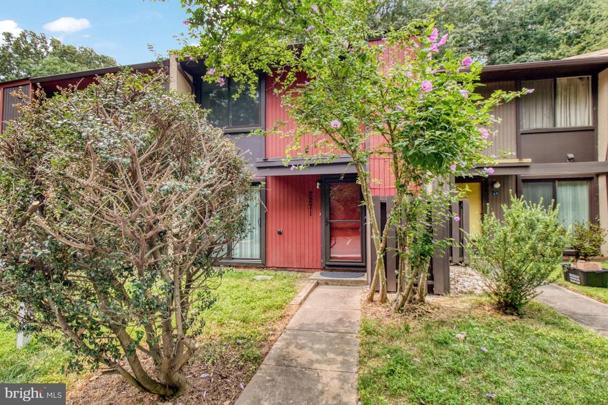 Contemporary townhome situated in the heart of Reston.  Conveniently located within walking distance to the metro, Reston Town Center and other shopping and is also close to Dulles Airport. This home offers a brand new kitchen, new LVP floors on lower level,  fresh paint and has a fenced in backyard with a patio that backs up to trees for privacy. The community offers walking trails through Reston and other great amenities!  One assigned parking space and two parking passes included.