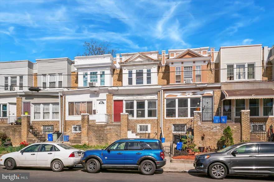 Now for sale in the Kingsessing neighborhood! A 3 bedroom, 1 bathroom rowhome with proximity to bus lines, the light rail, and Cobbs Creek Park. The home's main level includes an enclosed porch, open living/dining area with plenty of room for seating area and dining table, and kitchen with room for a small table or additional storage. Laminate flooring and recessed lighting throughout. Upstairs you'll find 3 bedrooms with ceiling lighting and hall bath with tub shower and built-in shelving for plentiful storage. The home also includes an unfinished basement and fenced yard. Additional features include laminate flooring throughout, recessed lighting downstairs, fresh paint throughout, and a new boiler. Buy this home for yourself or use it as your next investment property! Either way, schedule a showing and make an offer today!