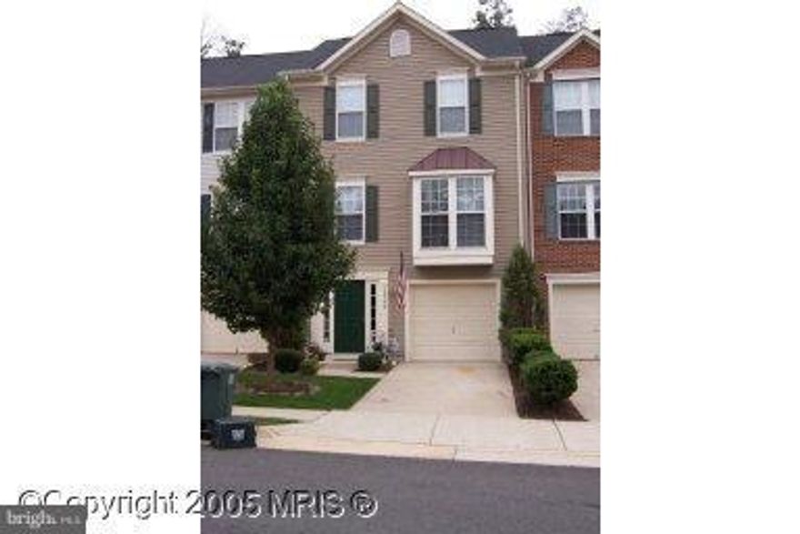 Beautiful 3 Bdrm, 2.5 Bath Townhouse in sought after Braemar Community. Private Driveway with Attached Garage. Entrance Level Recreation Room with Gas Fireplace and Walk-out to Fenced Backyard. Spacious Kitchen with Gas Stove. Large Master Suite with 2 Walk-in Closets. Close to Commuter Routes, Shopping & Restaurants.