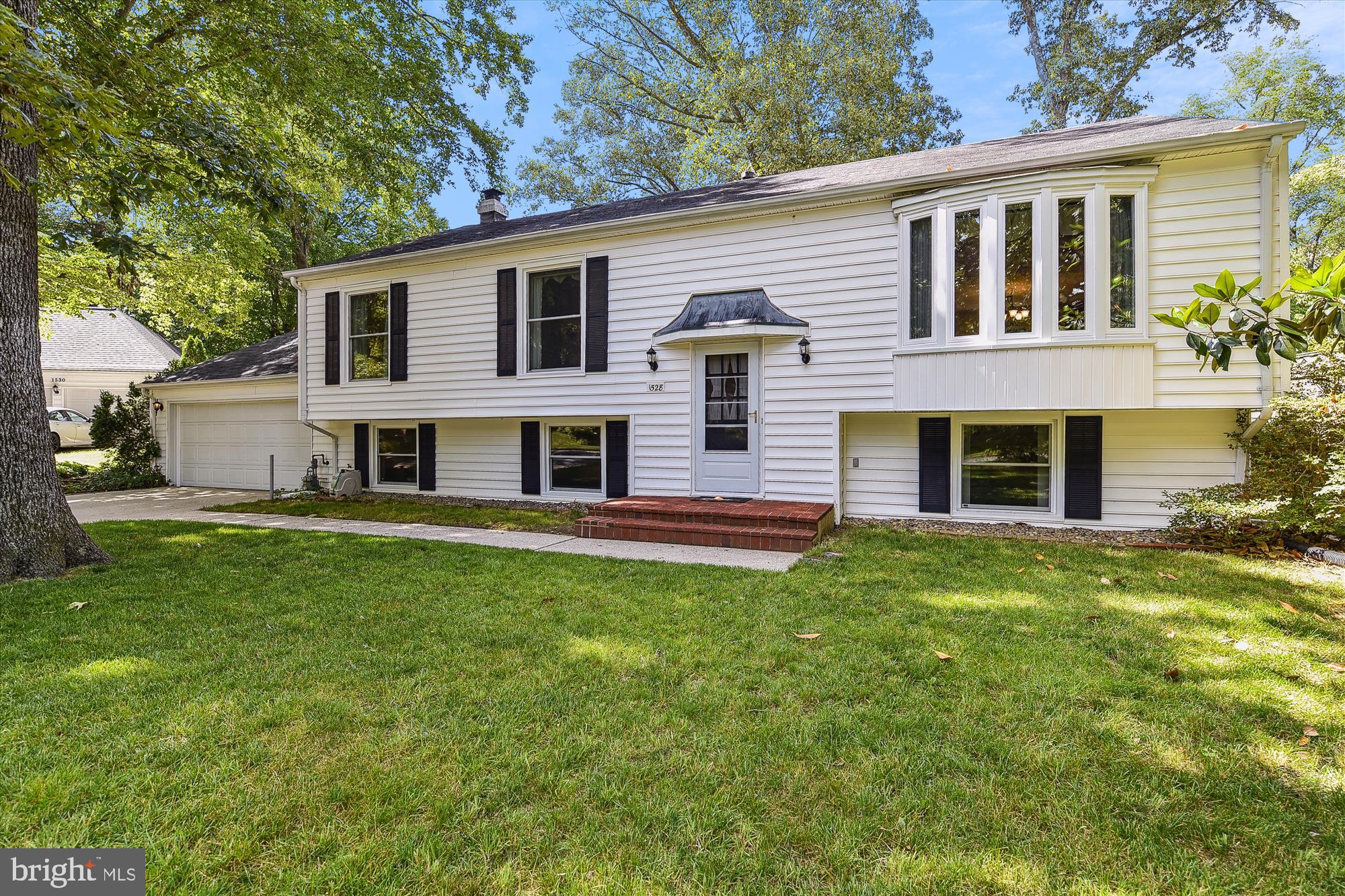 Nestled in the heart of the Crofton Triangle, this home is located on a quiet cul-de-sac and has four bedrooms, three full bathrooms and a versatile room for an office, craft room or separate den plus an extremely spacious lower level family room with a wood burning fireplace. The level, and partially fenced back yard, has a wonderful patio right off the dining room. The two car garage is deep and gives you additional storage space. The recent updates include; new hot water heater (2021), new HVAC (2019), new windows from Window Nation (2018), upper level hard wood floors were refinished in 2016, new flooring in the lower level, and there is an in-house duct cleaning system, plus natural gas for heat and the hot water.