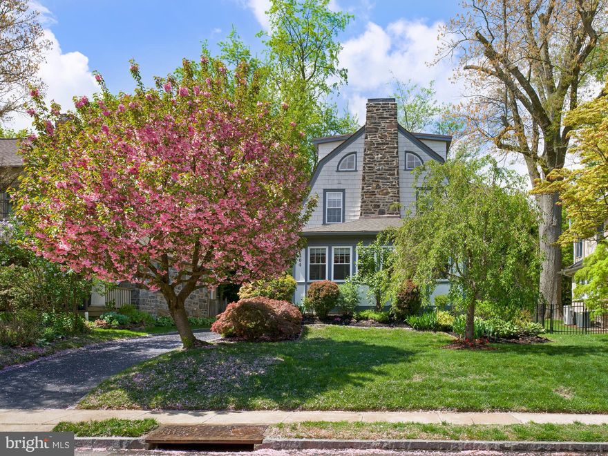 Set on a quiet, tree-lined street in Bala Cynwyd with sidewalks and a consistent presence of well-maintained, architecturally distinctive homes, this 5-bedroom, 3.5-bath Dutch Colonial reflects the enduring appeal of classic Main Line architecture. The exterior stonework and masonry signal a level of craftsmanship that defines the home, creating a sense of permanence and architectural integrity from the moment you arrive.

The main level is anchored by a renovated kitchen that functions as the center of the home—featuring a large granite island, farmhouse sink, stainless steel appliances, and generous cabinetry. It opens directly to a bright dining area and flows seamlessly to the rear deck and level, fenced backyard, creating a natural connection for both everyday living and entertaining. A spacious living room with fireplace, an enclosed, window-lined sunroom, and a first-floor powder room add to the home’s comfort and practicality.

Hardwood floors run throughout much of the home, reinforcing its warmth and continuity.

The second floor includes a primary suite with private bath and in-room laundry, along with two additional bedrooms and a hall bath. The third floor offers two more bedrooms and a full bath, allowing for flexible use as guest space, home offices, or additional living area, with separation from the main bedroom level.

An unfinished basement provides abundant storage and accommodates the home’s mechanical systems.

Outside, the deck overlooks a level, usable backyard—well-suited for play, entertaining, or everyday outdoor use. A large detached garden and storage shed add valuable additional storage, and off-street parking accommodates multiple vehicles.

Located within walking distance to Cynwyd Elementary, Bala Cynwyd Middle School, the Cynwyd Trail, and regional rail service to Center City, the home offers both neighborhood feel and commuter convenience.

The current owners have been attentive stewards, completing meaningful updates including a full kitchen renovation, roof replacement, updated electrical, HVAC improvements, plumbing updates, and ongoing exterior maintenance.

A home that gets the fundamentals right—setting, layout, and condition.