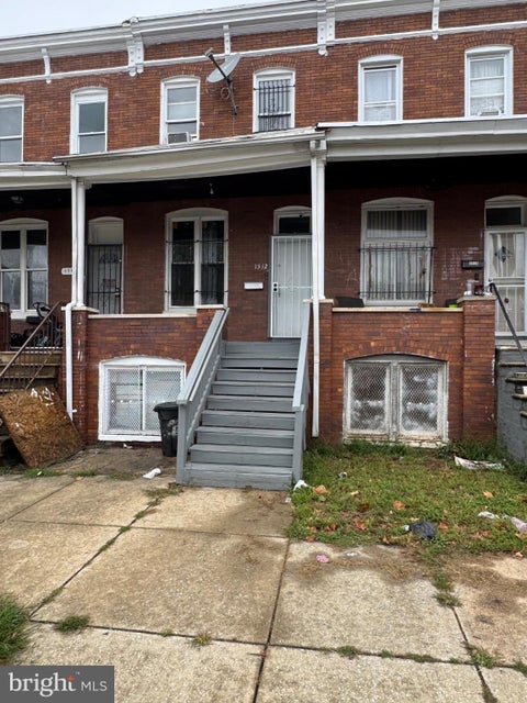 Photo of 1512 E 28th Street E, BALTIMORE, MD 21218 (MLS # MDBA2232838)