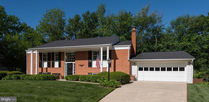 Beautifully updated all brick home with over 3000 sf of living and large backyard. Spacious light filled rooms, two fireplaces, walkout lower level with family room, large hobby room and bedroom with private bath. Two car garage. Walk to Spring Hill Elementary and Recreation Center and the Hamlet Swim and Tennis Club.