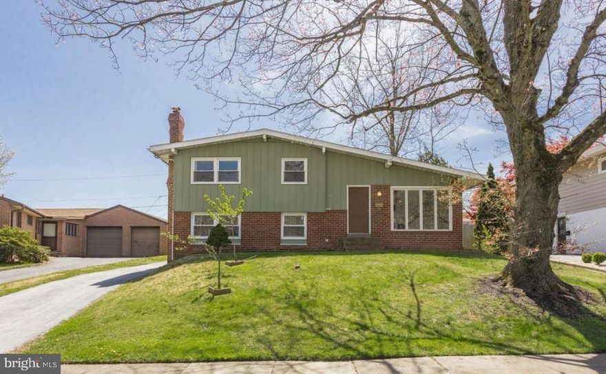 Rare, Lawrence Park, split level  home that is ready for a new owner!! In addition to the expansive living space there is also a  2 car detached garage.  You will find real hardwood floors through out the entire house. When you enter the front door you will  find a massive  living room that overlooks the front yard.   From there you enter the custom kitchen which has brand new stainless steel appliances, brick fireplace,  tile floors, tile backsplash, granite countertops and cathedral ceilings.   The upgraded 6 burner, Dacor stove will satisfy all your culinary needs.  There is an entrance off the kitchen which takes you to the 2 car garage and backyard deck.  A storage shed is also located in the backyard.  Upon entering the lower level you will see the office which leads to a massive living room, bathroom and extra laundry room.  The second floor contains the master bedroom, master bathroom, 2 additional bedrooms and another full bathroom.   Brand new HVAC system just installed in the home.  Come see this beautiful home and neighborhood!!