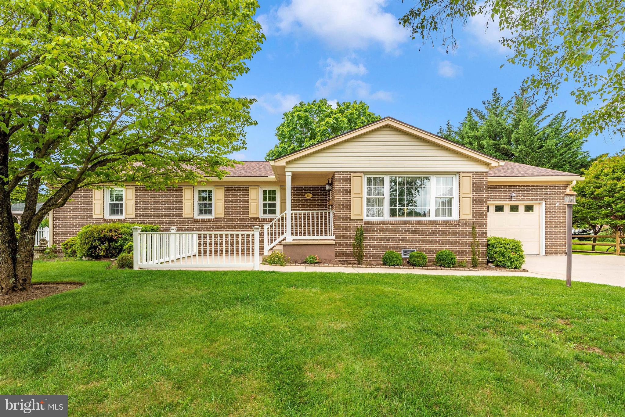 Meticulously maintained and updated! This solid brick ranch-style home is located in Northern Frederick County and offers 3 generously sized bedrooms, 2.5 bathrooms, and 2,024 finished living areas. Main-level living at its best! Enjoy the open concept flow, durability of hardwood, and abundant light throughout this home. The living room has a lovely brick hearth and gas fireplace. It flows seamlessly into the dining, kitchen, and sunroom areas and can easily accommodate large family gatherings. The country kitchen offers Silestone counters and abundant cabinetry. French doors lead into the HUGE sunroom/family room and will surely be your new favorite reading spot! It offers Anderson surround windows, a 2nd gas hookup option, built-in cabinetry, and leads out to a screened-in porch and deck area. The primary bedroom has a private bath with a ceramic tile shower and the largest walk-in closet with custom organizers and shelving you’ve ever seen! 2 additional bedrooms are generously sized and have custom closet organizers. The laundry is located on the main level. This home does offer some handicap updates throughout. The walkout unfinished lower level has a ½ bath, a wood-burning stove and is ready for your creativity! The large, private rear yard has a storage shed with electric and established landscaping. New roof and gutters. No HOA, super commuter location, and very close proximity to State & Federal parks, farmers markets, wineries, and orchards!