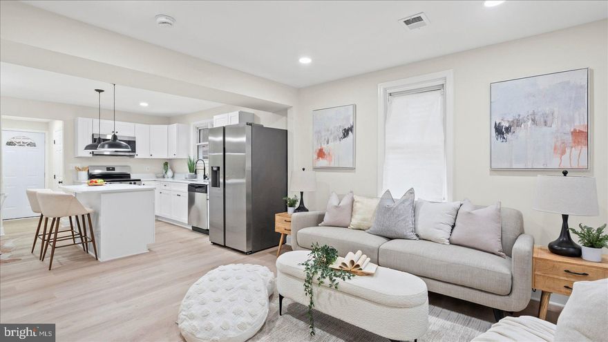 Welcome to this beautifully updated 4-bedroom, 2 full bath home in Dundalk offering modern comfort, flexible living space, and thoughtful upgrades throughout. The main level features a spacious primary bedroom with a private en suite bath, providing convenience and privacy. Step into the open-concept main living area where luxury vinyl plank flooring flows seamlessly through the living room, dining area, and stunning kitchen. The luxury kitchen is designed to impress with a large island, quartz countertops, modern cabinetry, and plenty of space for cooking, gathering, and entertaining. Outside, the fully fenced yard offers both privacy and functionality, while the long driveway provides ample off-street parking. A detached garage adds even more value with a finished space that’s perfect for a home office, gym, hobby room, or additional entertaining area. With four bedrooms, two full baths, stylish finishes, and versatile indoor and outdoor spaces, this Dundalk home combines modern upgrades with everyday practicality. You are a minutes away from schools, 695 & 95, shopping at Eastpoint Mall, and plenty of  amazing restaurants like the Famous Jimmy's Seafood! Come check it out today!