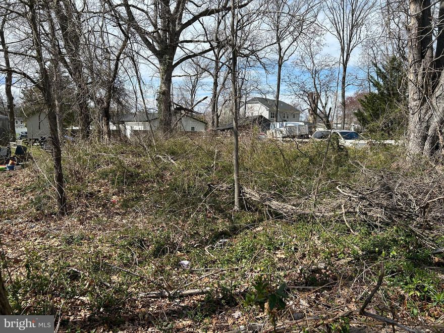 INVESTOR / BUILDER OPPORTUNITY KNOCKS on this buildable lot on a cul de sac in a great location. Utilities hook-up available. Public water and sewer needs to be connected.  Close to Route 1, Old Town Alexandria, Ft. Belvoir, bus stop, shopping, schools, library, parks and Inova Mt. Vernon Hospital.  Survey available.