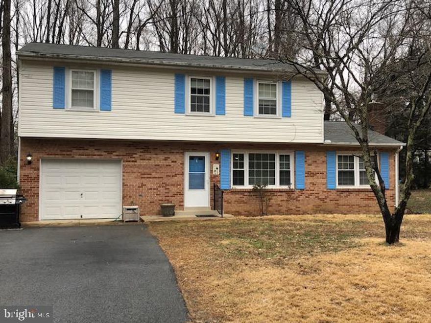 PRICE REDUCTION  Below appraisal Beautiful well kept 2 story in private setting. Come enjoy your evenings on the deck in this peaceful location. Close to shopping,schools and the waterfront restaurants. 4 bedroom. 2 1/2 bath with large eat in kitchen and large family room with gas fireplace. Large living room and a great entertaining flow through the  house. New septic fields in 2017, Roof is 3 yrs new, new oil tank in 2018, new D/W and W/D in 2019. Ceramic tile in bathrooms and kitchen.  Priced to sell quickly -Honey STOP the car. (please note- electric chair lift on stairs will be removed by seller prior to closing)