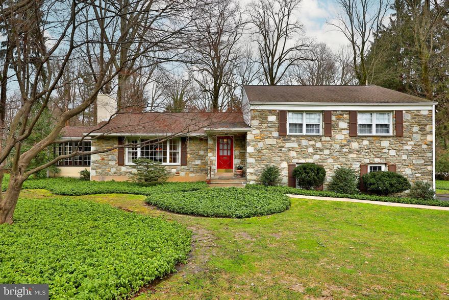 Spectacular location in Huntingdon Valley right near the June Fete area. Spacious  4 bedroom 2.5 bath stone front split level with with bonus sub basement to maximize living space.  Hardwood floors throughout.  You will relish the abundance of crown molding and chair rail  that graces the rooms. This home makes a statement from the curb, right up the beautiful walkway and into the spacious foyer.  Magnificent formal living room, boasts a large picture window where views abound and a double stone fireplace (shared with the sunroom/solarium). Formal dining room with French Doors to the upper slate patio ..the spectacular views are breathtaking. A wonderful eat in kitchen with an abundance of cabinetry and granite counter space with an extra buffet area. Upper level has 4 spacious bedrooms each able to accommodate  King furniture. The main bedroom with 2  huge closets and a most artistic alcove for that special piece of furniture and of course it's own ceramic tile bath with stall shower. The hall bath is spacious and convenient with tub/shower. The 2nd floor hall houses several closets & pull down stairs to the attic.  Lower level family room with stone fireplace, rustic mantle and raised hearth is perfect for relaxing or entertaining with sliders to the lower slate patio with scenic rural views, and easy access to the attached 2+ car garage. The ceramic tile laundry (with side entry to the yard) is spacious with additional storage.  And then the lower basement has a finished area perfect hobbies or play and an unfinished area housing the well and water conditioning equip, heater and oil tank  with plenty of serious storage. This well maintained home is ideally located for transportation, shopping, recreation and cultural activities. Pack your bags and come and put down your roots. PUBLIC RECORDS ARE  INCORRECT.... HOME HAS PUBLIC SEWER!  No escalation addendums. Settlement no sooner than 4/1/24. Deadline for offers 2/5/24 with decision 2/6/24